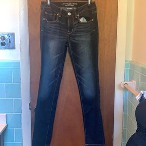Dark navy wash skinny jeans